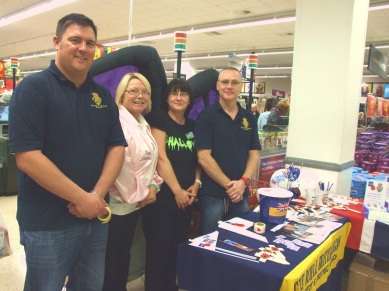Simon and George from the Consett and District Branch of the Royal British Legion are joined by ASDA Management team Marsha and Anne.