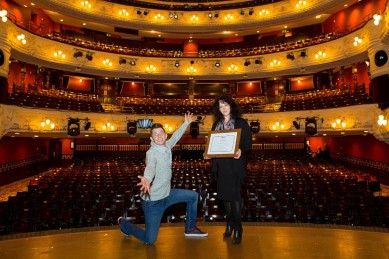 Panto star and relaxed performance performer Danny Adams helps celebrate with Director of Operations Dawn Taylor.