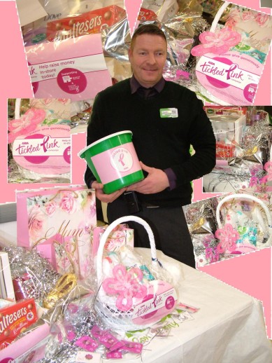 ASDA Stanley Assistant Branch Manager, David Savory, launches the local 2015 Tickled Pink Campaign surrounded by a selection of fundraising items.