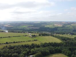 Jimmy Anderson of Ebchester An aerial view looking across Ebchester and the Derwent Valley, with farmland, hedgerows, woodland and scattered houses stretching to the horizon